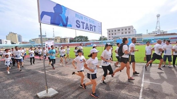 Rendez-vous en septembre pour la course caritative Run to Give au Vietnam hinh anh 1