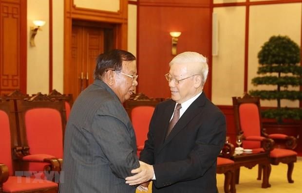 Le leader du Parti et president Nguyen Phu Trong recoit son homologue lao Bounnhang Vorachit hinh anh 1