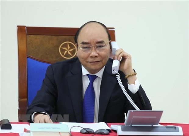Le PM Nguyen Xuan Phuc s'entretient par telephone avec son homologue australien hinh anh 1
