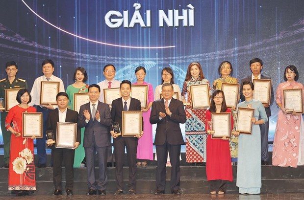 Les etrangers contribuent activement a la promotion de l’image du Vietnam hinh anh 2