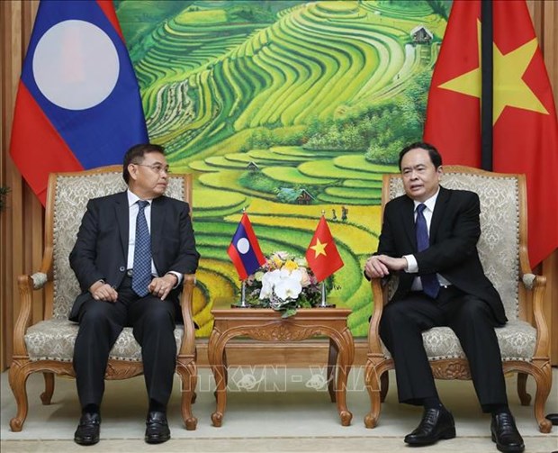 Le president du Front de la Patrie du Vietnam recoit son homologue lao hinh anh 1