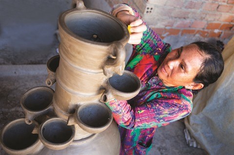 L’art de la poterie Cham hinh anh 1