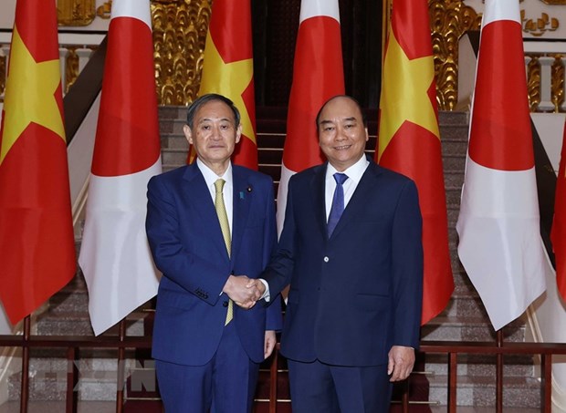 Entretien entre le PM Nguyen Xuan Phuc et son homologue japonais Suga Yoshihide hinh anh 1
