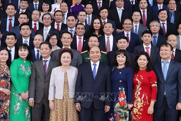 Le PM rencontre les entreprises primees «Meilleures marques vietnamiennes de 2020 hinh anh 1