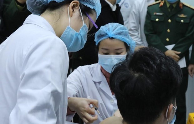 Le Vietnam est l'un des pays ayant un taux le plus eleve de population acceptant de vaccins hinh anh 1