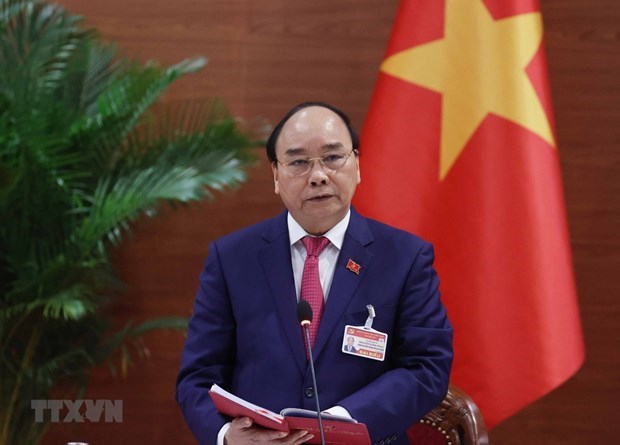 Le PM du Laos felicite son homologue vietnamien Nguyen Xuan Phuc hinh anh 1