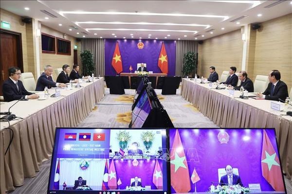 Renforcement de l’efficacite de la cooperation entre le Vietnam, le Laos et le Cambodge hinh anh 1