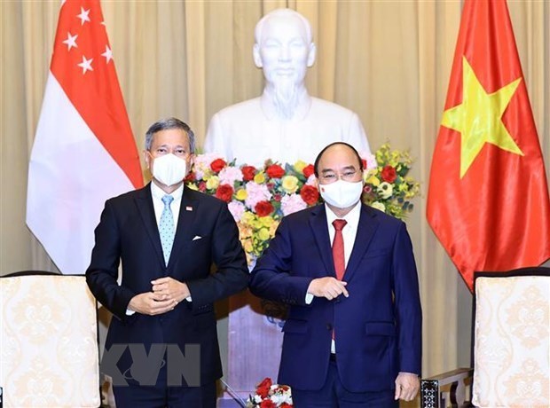 Le president Nguyen Xuan Phuc recoit le ministre des Affaires etrangeres de Singapour hinh anh 1