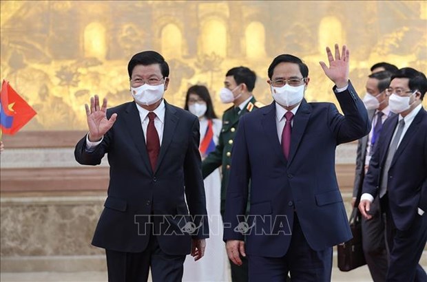 Les dirigeants vietnamien et lao s'accordent sur les orientations de la cooperation hinh anh 1