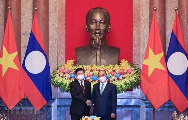 La visite officielle du president vietnamien reaffirme un soutien total au Laos hinh anh 1