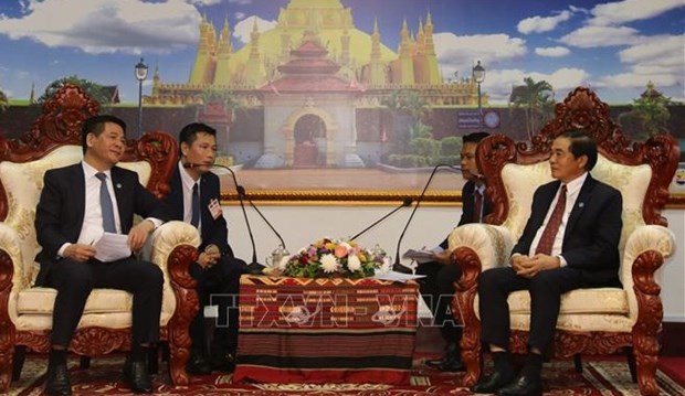Vietnam-Laos : renforcement de la cooperation dans l'industrie, le commerce et la justice hinh anh 1
