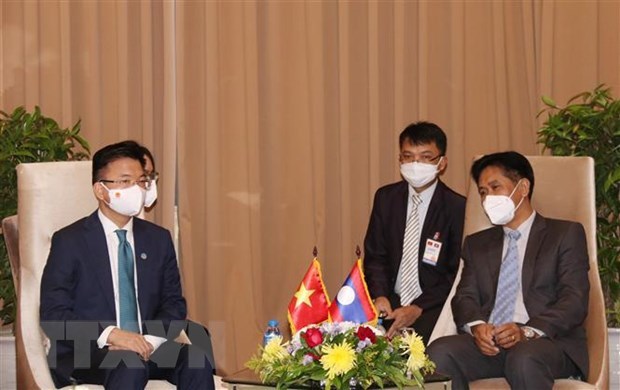 Vietnam-Laos : renforcement de la cooperation dans l'industrie, le commerce et la justice hinh anh 2