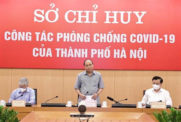 A Hanoi, le president salue une "mobilisation exemplaire" contre le Covid-19 hinh anh 2