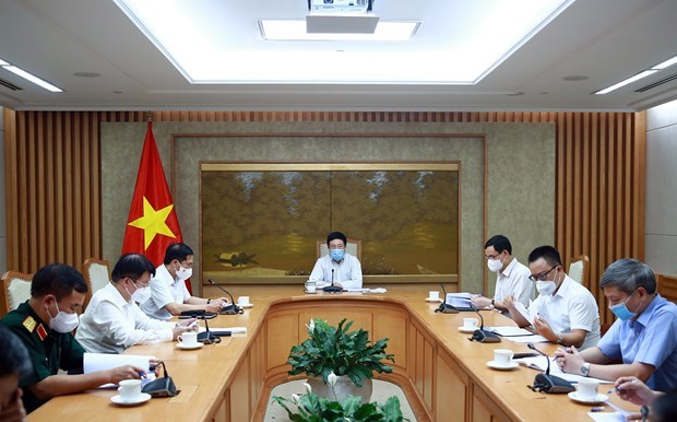 La reunion du Groupe de travail du gouvernement sur la diplomatie vaccinale hinh anh 1