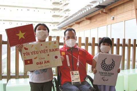 Tokyo 2020 : l'halterophile Le Van Cong se transcende et decroche la medaille d’argent hinh anh 3