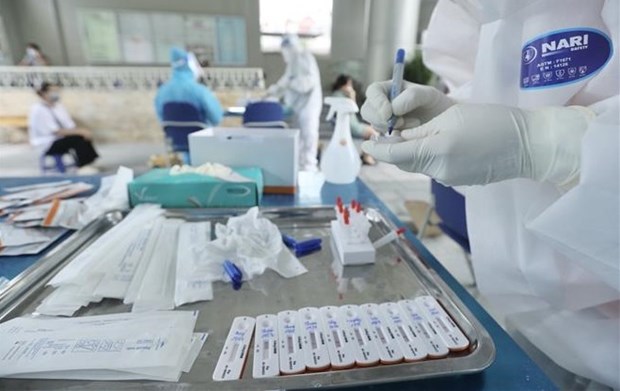 COVID-19 : Acceleration des tests et de la vaccination a Hanoi et Ho Chi Minh-Ville hinh anh 2