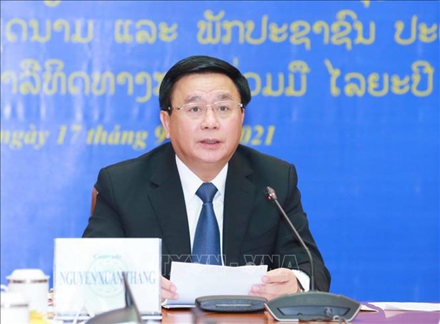 Vietnam-Laos : Conference en ligne sur la cooperation entre les deux Partis dans plusieurs domaines hinh anh 2