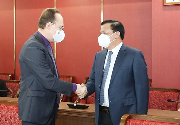 Le secretaire du Comite municipal du Parti de Hanoi recoit l’ambassadeur de Russie hinh anh 1