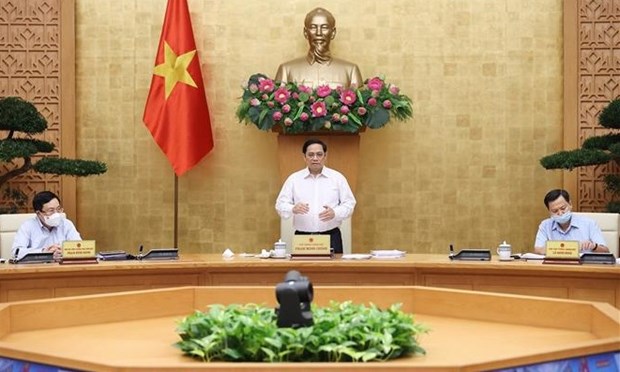 Le Premier ministre preside la reunion de septembre du gouvernement hinh anh 1