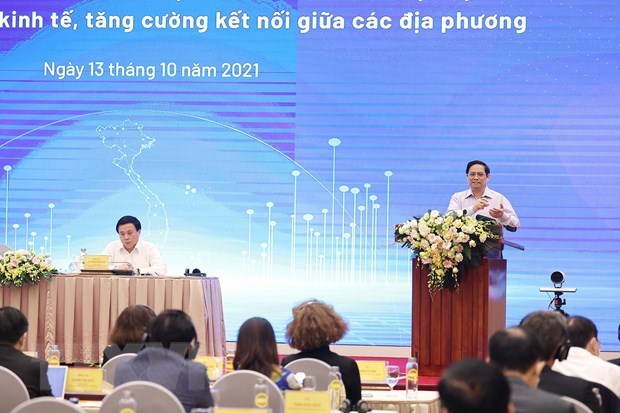Le PM : Persister dans la lutte contre l'epidemie, assurer les grands equilibres de l'economie hinh anh 1