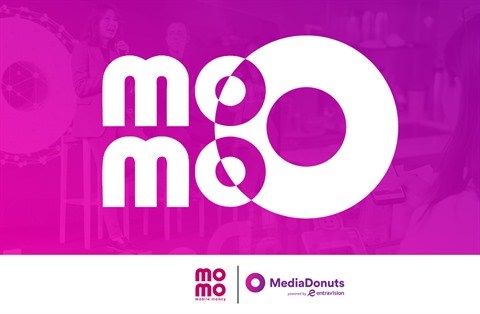Cooperation strategique entre MoMo et MediaDonuts hinh anh 1