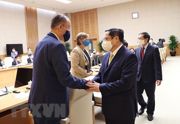 Le PM recoit une delegation de representants des organes onusiens au Vietnam hinh anh 1