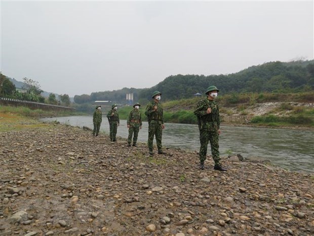 Renforcement de la cooperation entre de gardes-frontieres vietnamiennes et chinoises hinh anh 1