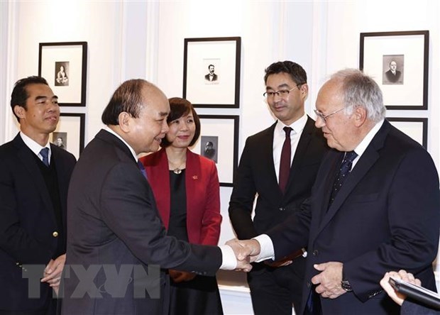 Activites du president Nguyen Xuan Phuc en Suisse hinh anh 2