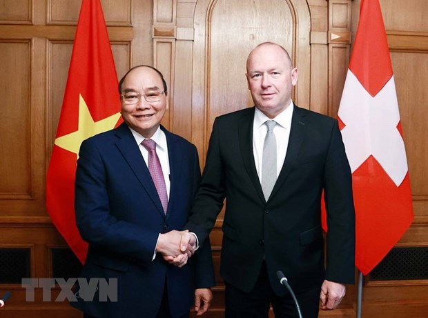 Le president Nguyen Xuan Phuc rencontre le president du Conseil national suisse hinh anh 1