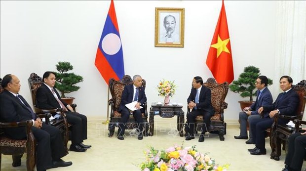 Le vice-PM Le Van Thanh rencontre le vice-president de l’AN lao hinh anh 1