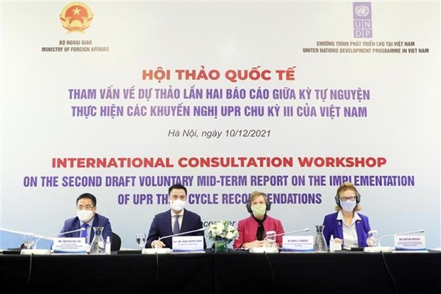 EPU : Consultation sur le 2e projet de rapport volontaire a mi-parcours du Vietnam hinh anh 1