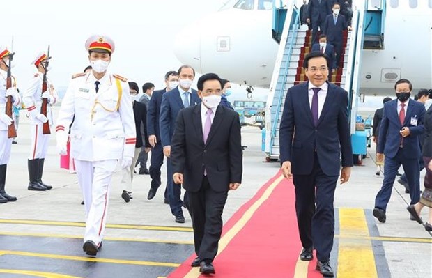 Le Premier ministre lao Phankham Viphavanh entame sa visite au Vietnam hinh anh 2