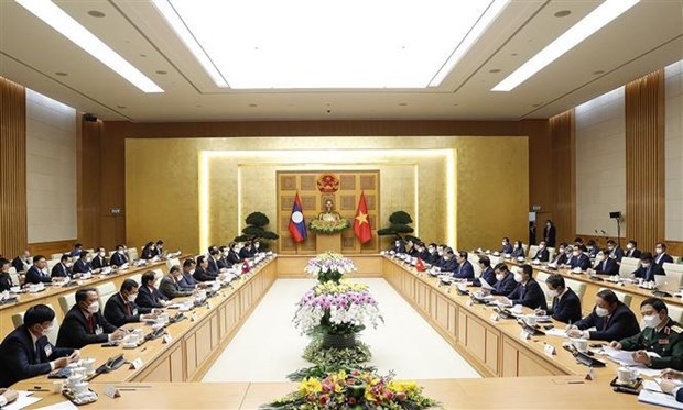 Entretien entre les Premiers ministres du Vietnam et du Laos hinh anh 1