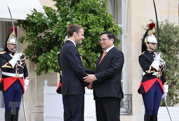 La France est aux cotes du Vietnam pour faire face ensemble aux defis hinh anh 2