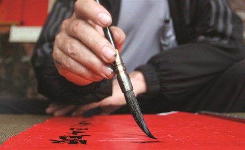 La calligraphie en quoc ngu, une tendance a maintenir hinh anh 1