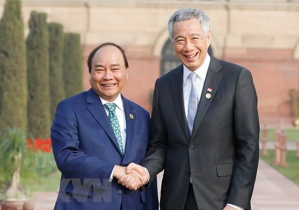 La visite d’Etat a Singapour du president vietnamien "reaffirme les excellents liens" hinh anh 1