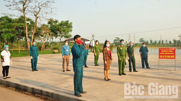 La force de milice et d’autodefense de Bac Giang s’engage dans la lutte anti-Covid-19 hinh anh 2
