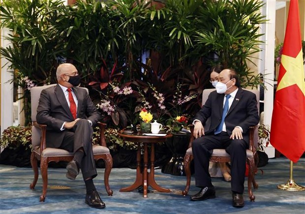 Le president Nguyen Xuan Phuc rencontre des entreprises singapouriennes hinh anh 2