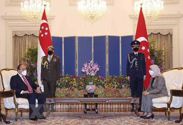 La visite d’Etat du president vietnamien a Singapour concretise la politique exterieure hinh anh 1