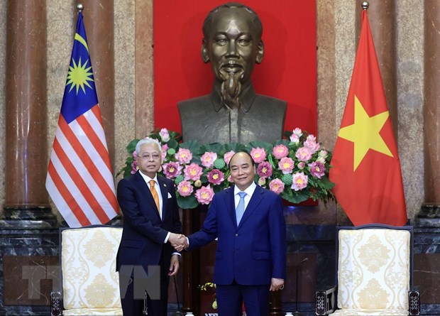 Le president Nguyen Xuan Phuc recoit le Premier ministre malaisien hinh anh 1
