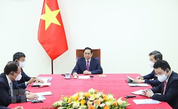 Le PM Pham Minh Chinh s’entretient au telephone avec le president fondateur du WEF hinh anh 1