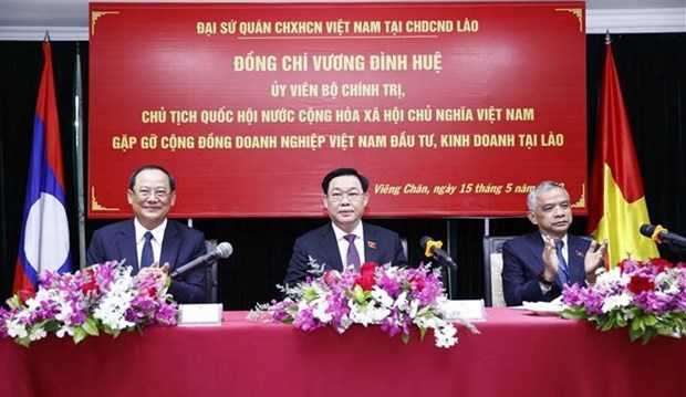 Les entreprises sont invitees a aider a faire des percees au liens economiques Vietnam-Laos hinh anh 1