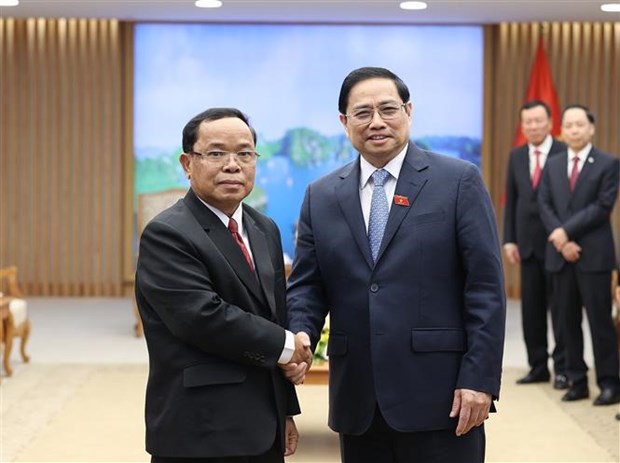 Le PM recoit le chef de la Commission centrale de controle et Inspecteur general d’Etat du Laos hinh anh 1