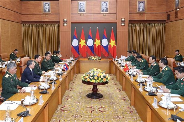 Vietnam et Laos renforcent la cooperation bilaterale dans la defense hinh anh 2
