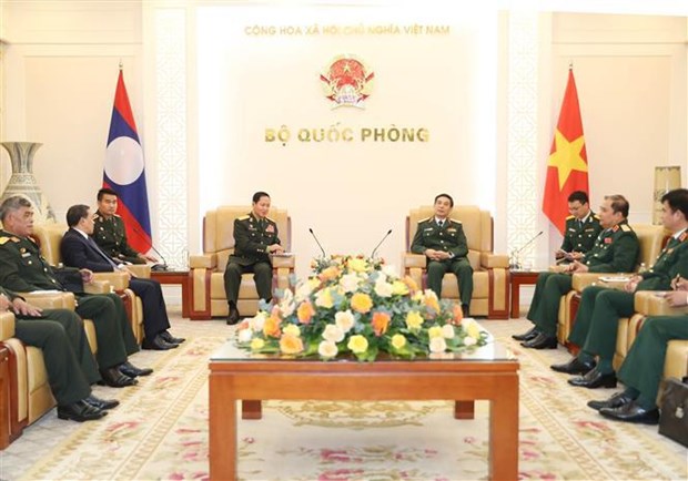 Vietnam et Laos renforcent la cooperation bilaterale dans la defense hinh anh 3