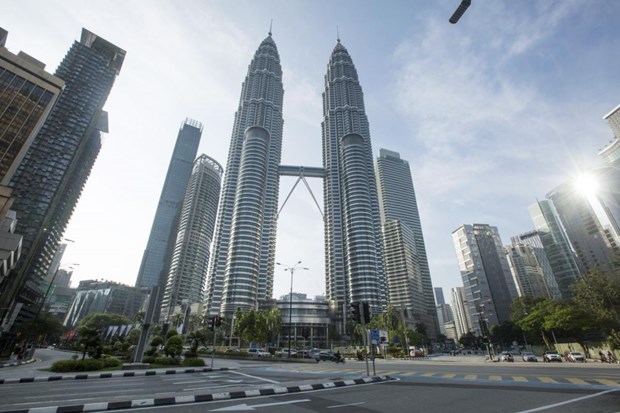 La Malaisie et le Royaume-Uni signent un accord de partenariat pour le climat hinh anh 1