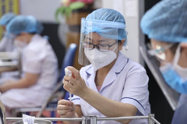 Le solide systeme de vaccination aide le Vietnam a se tenir ferme face au Covid-19 hinh anh 2