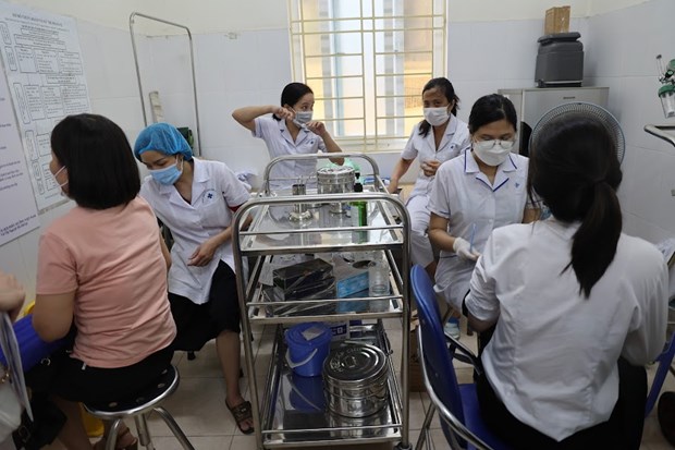 Covid-19 : le Vietnam enregistre 1.292 nouveaux cas en 24 heures hinh anh 1