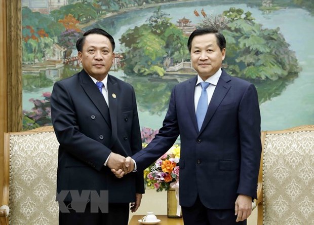 Le vice-PM Le Minh Khai recoit le ministre des Finances du Laos hinh anh 1