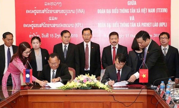Vietnam-Laos : Une cooperation amicale etroite entre les deux agences de presse hinh anh 2